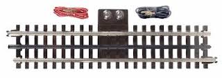 10'' STRAIGHT TERMINAL TRACK Atlas Item# 6010. A piece of track that allows a simple connection of a power source to your 3-rail layout. Easy hook-up with no extra drilling required.